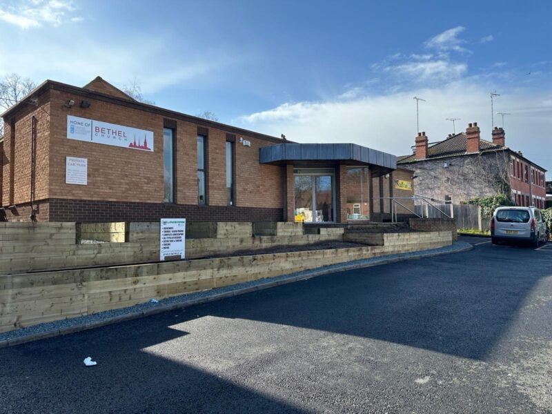 Outside shot of a brown brick single-storey building with the sign 'Bethel Church'.
