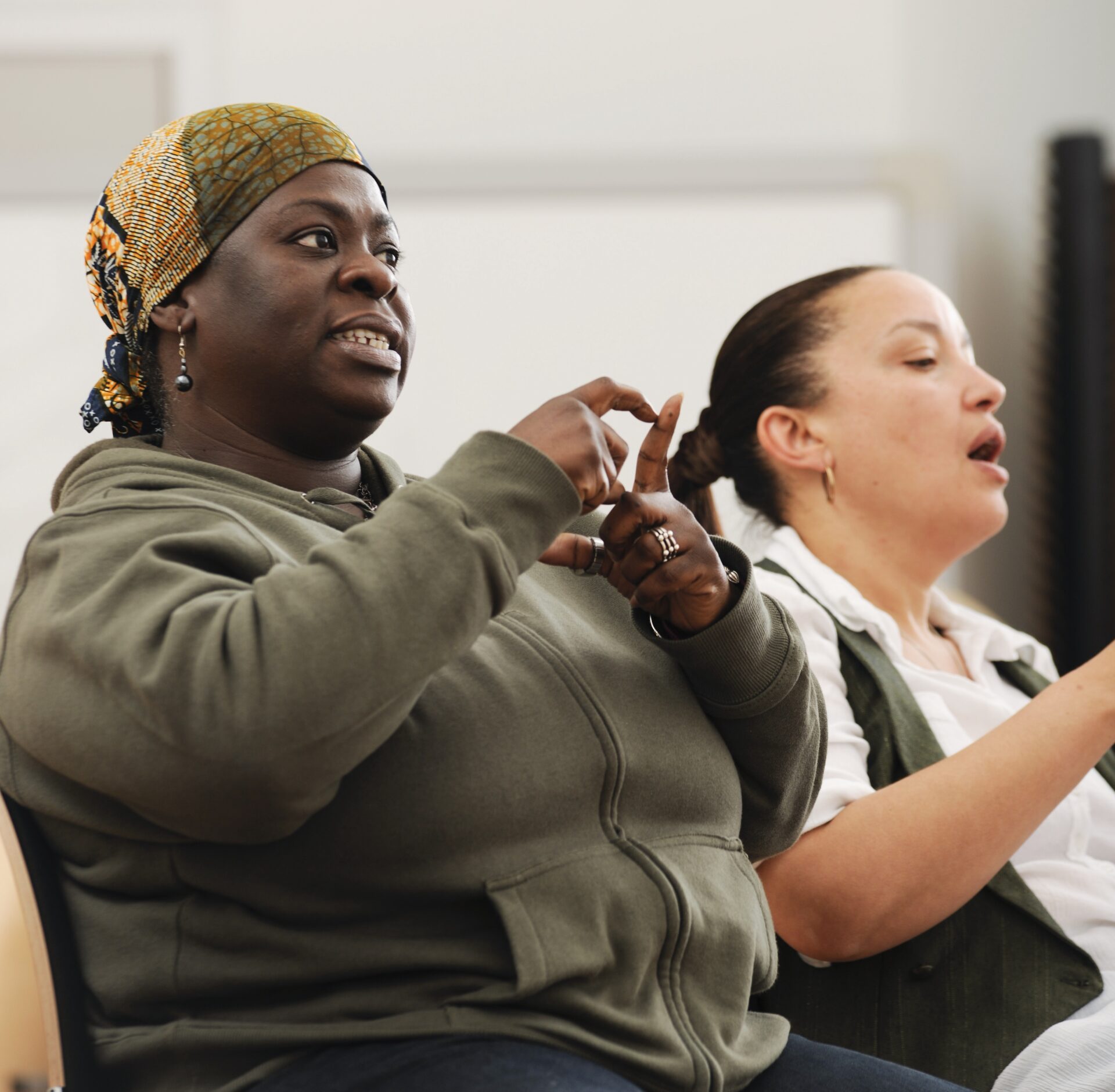 Students using british sign language.