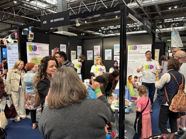 BID's busy stall, with lots of attendees chatting with our staff in British Sign Language.