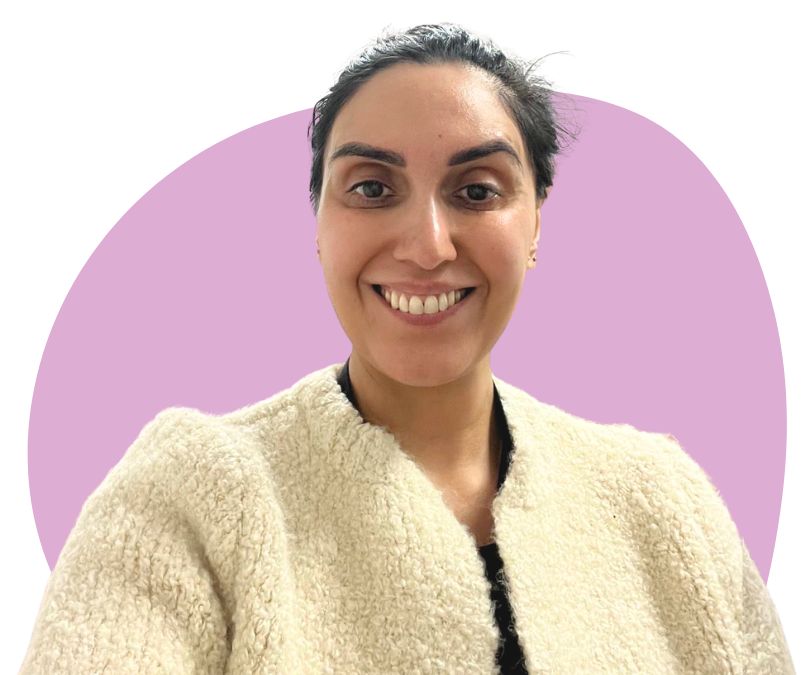 Asian woman with black hair against a purple background.